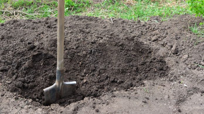 Ohios-extreme-sports-betting-proposal-buries-good-policy-ideas A shovel in the ground digging a hole
