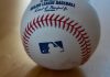 Prediction Markets Weekly: MLB, NFL, big banks and a Good Friday in court A baseball bearing the MLB logo