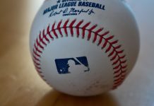 A baseball bearing the MLB logo