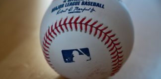 A baseball bearing the MLB logo
