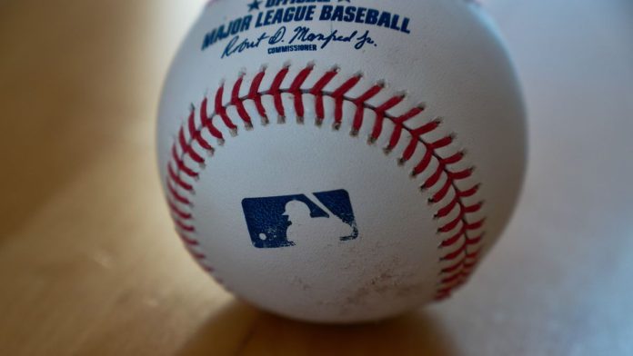 A baseball bearing the MLB logo