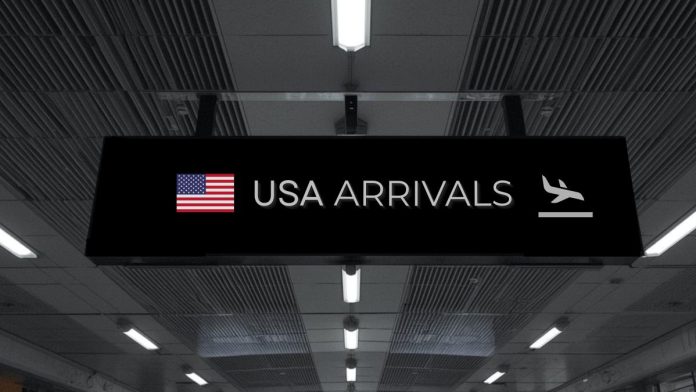A U.S. arrivals sign at an airport