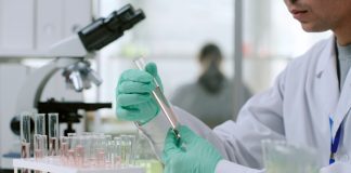 Scientist as Scientific Games secures a deal with the Minnesota Lottery.