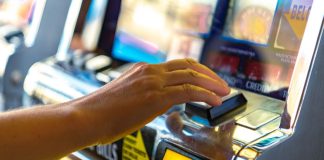 A person playing a gaming machine