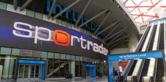 Sportradar sign as the company releases its latest earnings report.