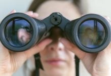 A person with binoculars as the AGA shares its latest industry outlook.