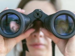A person with binoculars as the AGA shares its latest industry outlook.