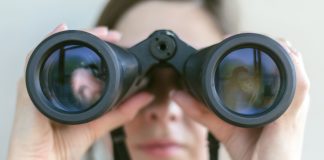 A person with binoculars as the AGA shares its latest industry outlook.