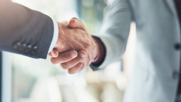 Business-handshake SBC Summit Americas