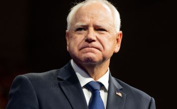 Minnesota Gov. Tim Walz as the CFTC sues the state over a prediction market ban.