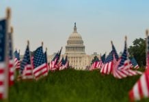 Bipartisan Congressional bill would mandate federal study on gambling disorders The US Capitol building with US flags in the foreground