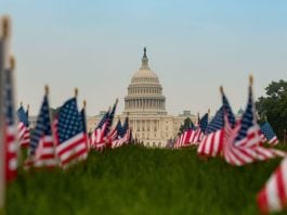 Bipartisan Congressional bill would mandate federal study on gambling disorders The US Capitol building with US flags in the foreground