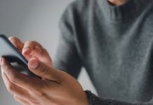 Colorado becomes first state to ban push notifications for sportsbooks Person on cellphone as Colorado bans sportsbooks from sending push notifications.