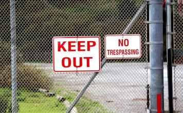 Nevada Gaming Control Board wants Kalshi held in contempt over geofencing A 'Keep Out' sign on a fence