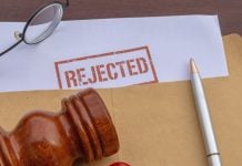 Polymarket loses bid for preliminary injunction against Michigan A stamp saying "Rejected" on a document