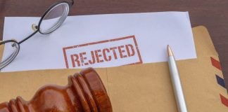 Polymarket loses bid for preliminary injunction against Michigan A stamp saying "Rejected" on a document