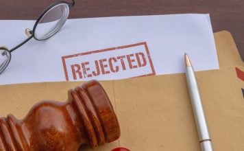 Polymarket loses bid for preliminary injunction against Michigan A stamp saying "Rejected" on a document