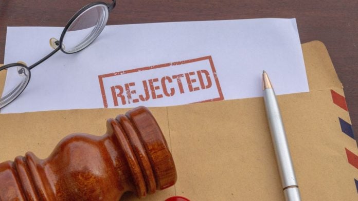 Polymarket-loses-bid-for-preliminary-injunction-against-Michigan A stamp saying "Rejected" on a document