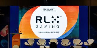 RLX Gaming names ReelPlay as first US online casino aggregation partner The RLX Gaming logo at an SBC event