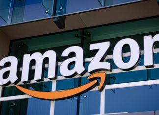 Amazon agrees to settle social casino class-action lawsuit for over $200M Amazon logo as the company agrees to settlement concerning social casinos.