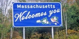 Welcome to Massachusetts sign as Aristocrat enters the state's iLottery market.