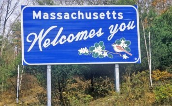 Welcome to Massachusetts sign as Aristocrat enters the state's iLottery market.
