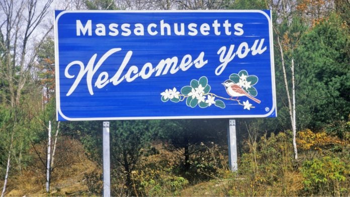 Welcome to Massachusetts sign as Aristocrat enters the state's iLottery market.