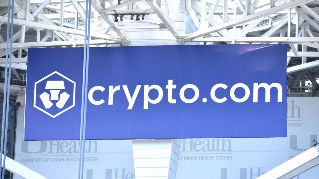 A branding sign for Crypto.com