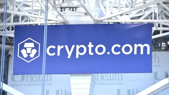 A branding sign for Crypto.com