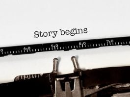 Vintage typewriter on white background with text "story begins"