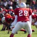 Bill Pascrell III: What does the future of US betting integrity actually look like? american football game with out of focus players in the background