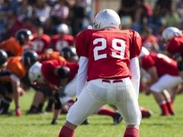 Bill Pascrell III: What does the future of US betting integrity actually look like? american football game with out of focus players in the background