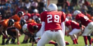 Bill Pascrell III: What does the future of US betting integrity actually look like? american football game with out of focus players in the background