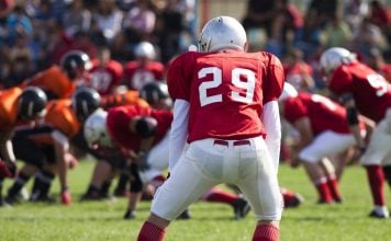 Bill Pascrell III: What does the future of US betting integrity actually look like? american football game with out of focus players in the background
