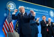 U.S. President Donald Trump dances on stage