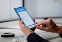 A person completing a survey as FGS Global provides a prediction market and sports betting report.