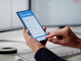 A person completing a survey as FGS Global provides a prediction market and sports betting report.