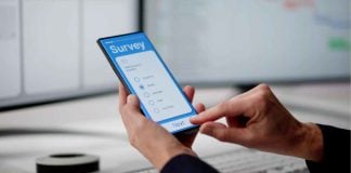 A person completing a survey as FGS Global provides a prediction market and sports betting report.