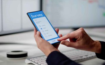 A person completing a survey as FGS Global provides a prediction market and sports betting report.