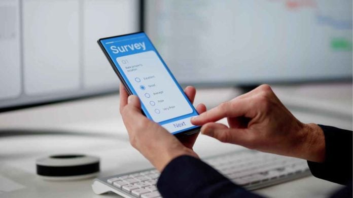 A person completing a survey as FGS Global provides a prediction market and sports betting report.