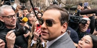 George Santos trades $35,000 to end CFTC probe into Kalshi activity George Santos among a crowd of reporters