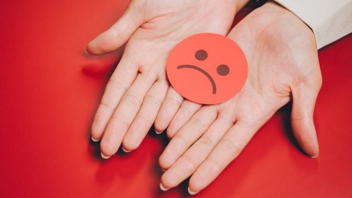Outstretched hands with sad face Outstretched hands seeking relief, similar to Kalshi's letter
