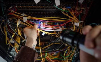 Schneider: Wire Act should be front and center in prediction markets talk Man working with wires and flash light