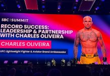 UFC star Charles Oliveira appears on the main stage at SBC Summit in Lisbon