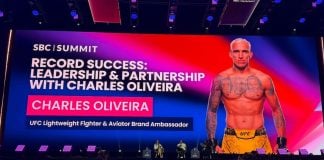 UFC star Charles Oliveira appears on the main stage at SBC Summit in Lisbon