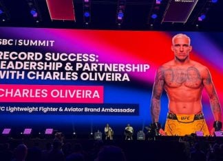 UFC star Charles Oliveira appears on the main stage at SBC Summit in Lisbon