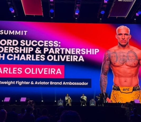 UFC star Charles Oliveira appears on the main stage at SBC Summit in Lisbon