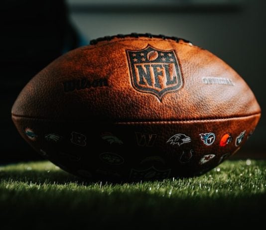NFL remains strongest skeptic of prediction markets among US leagues NFL football on grass in dark light