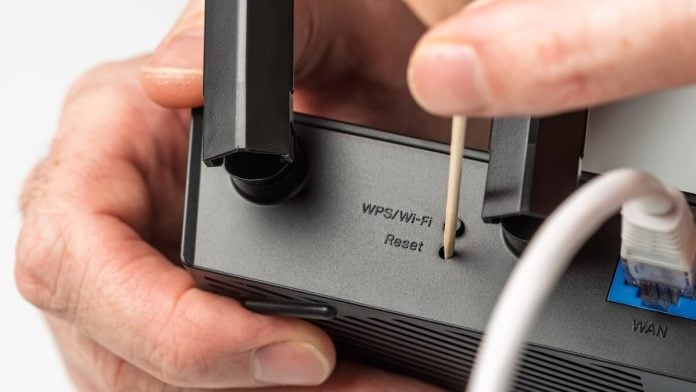 Reset button on a router Kalshi resets news week with Santos ban