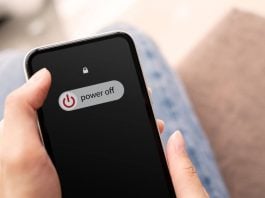 Someone sliding 'power off' on their phone